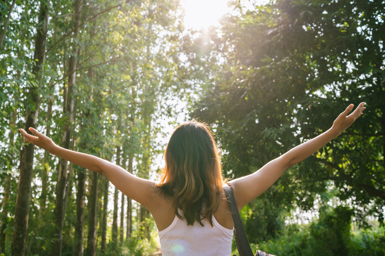 Guest enjoying nature at an eco-friendly vacation rental.